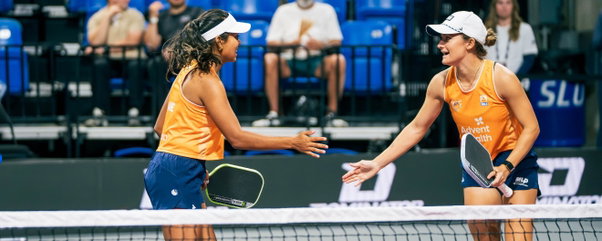 Milan Rane and Lacy Schneemann celebrating a point for the Orlando Squeeze at MLP St. Louis.