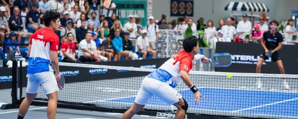 Pablo Tellez wearing a red and white jersey.