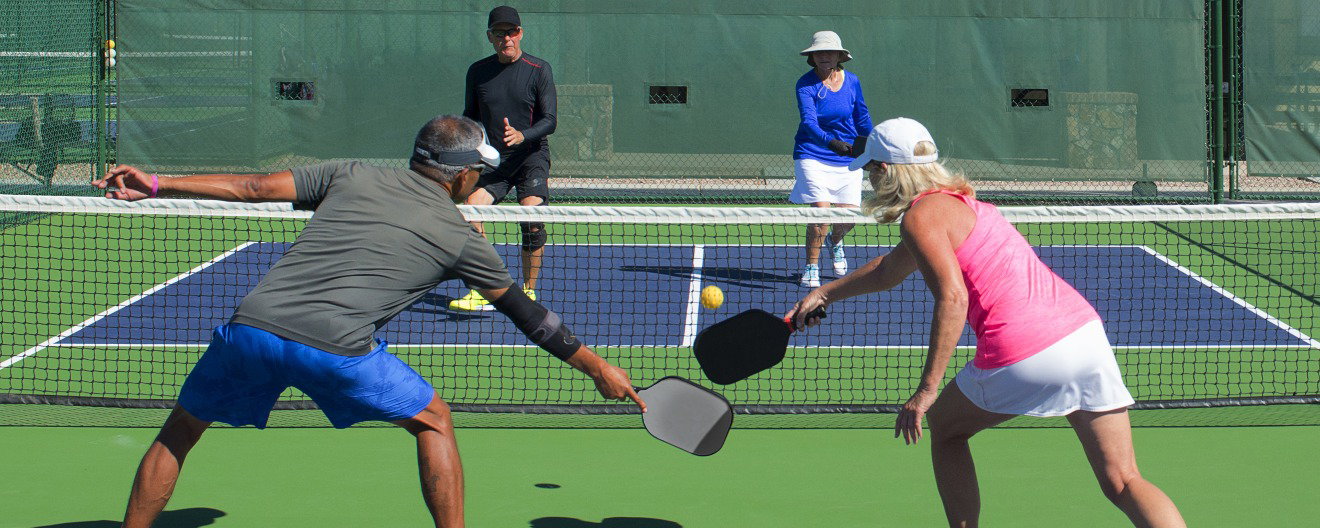 A mixed doubles match in progress.