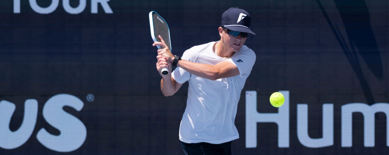 Hayden Patriquin hitting a backhand drive.