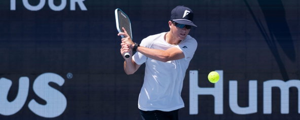 Hayden Patriquin hitting a backhand drive.