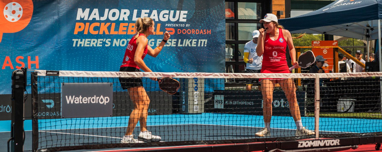 Judit Castillo and Danni-Elle Townsend celebrating a point for the Columbus Sliders at MLP Austin presented by Waterdrop.