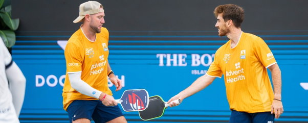 Jack Sock and Federico Staksrud celebrating a men's doubles point for the Orlando Squeeze at MLP St. Petersburg.