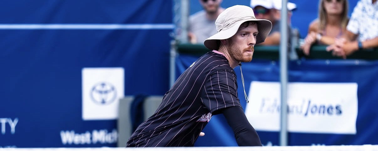 Joey Wild wearing a wide-brim bucket hat playing pro pickleball.