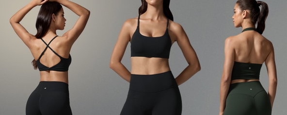 Three women wearing athletic tops and leggings.