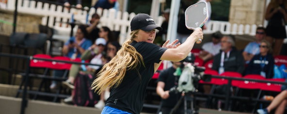 Danni-Elle Townsend hitting a return on the pickleball court last season.