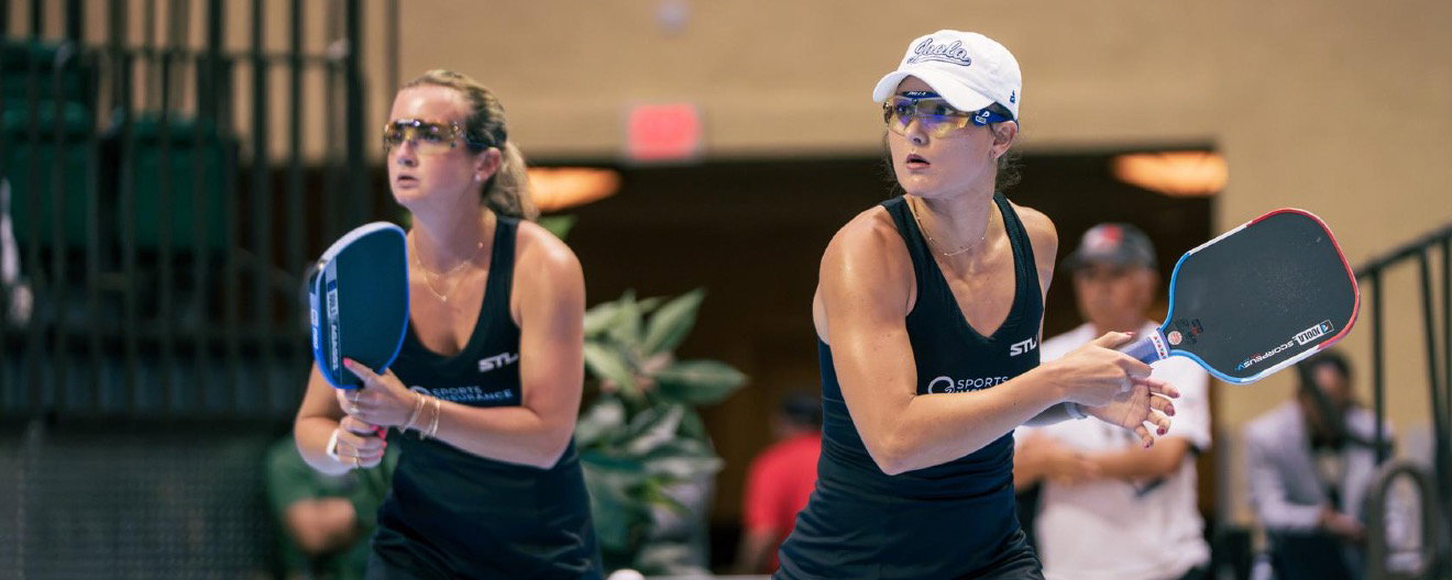 Kate and Anna playing pro pickleball