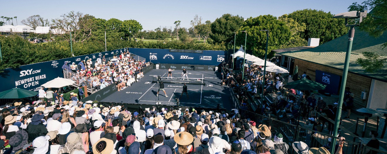 Stands around the pickleball center court.