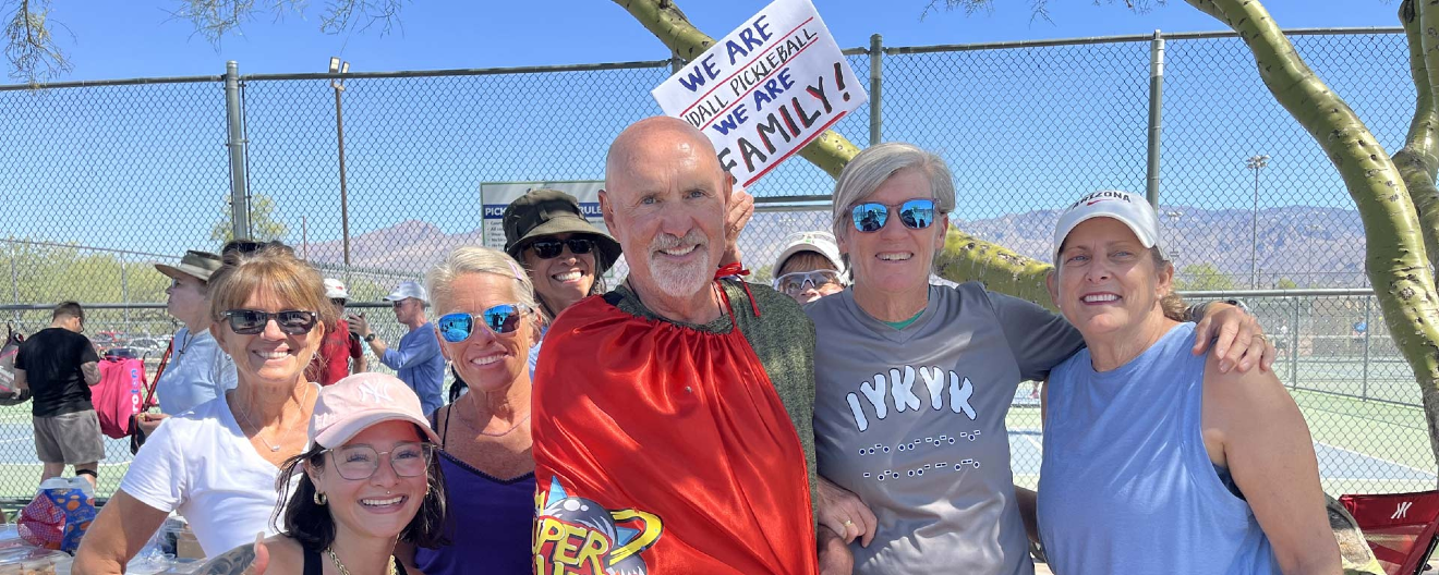 Leonard Finkel (center) poses with Tucson Area Pickleball members at Udall Park on May 8, 2026.