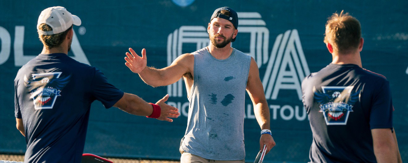 Players high fiving after a game of pickleball