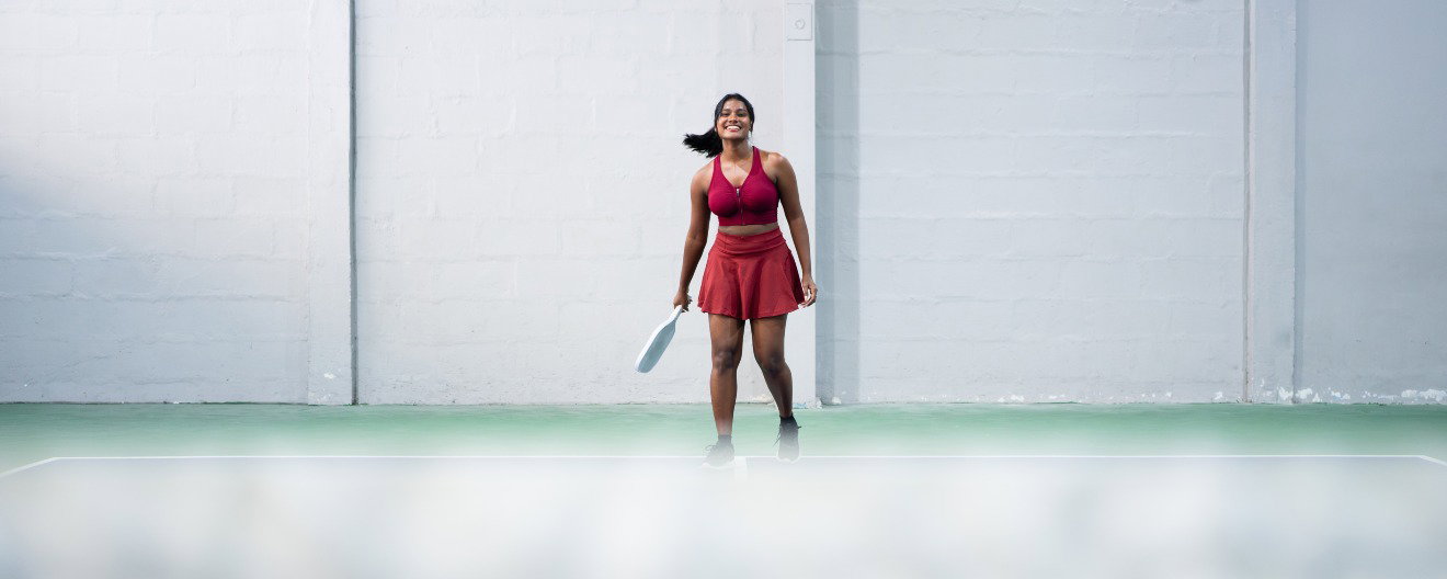A female pickleball player.