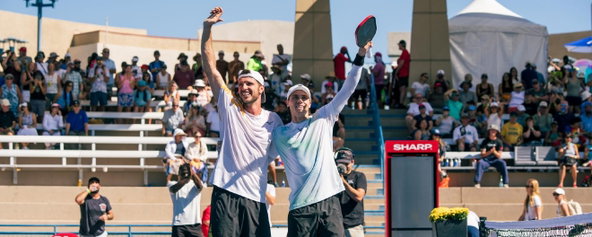 Christian Alshon and Andrei Daescu celebrating winning the men's doubles title at the Rate Las Vegas Open presented by JOOLA.