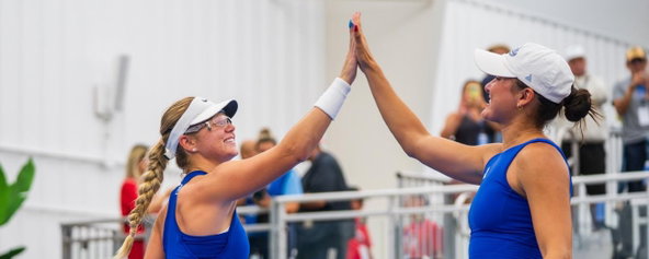 Anna Leigh Waters and Anna Bright celebrating their women's doubles title at the Veolia Chicago Cup.
