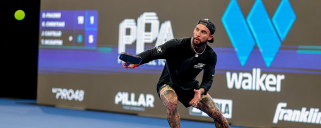 McGuffin playing pro pickleball, wearing all black