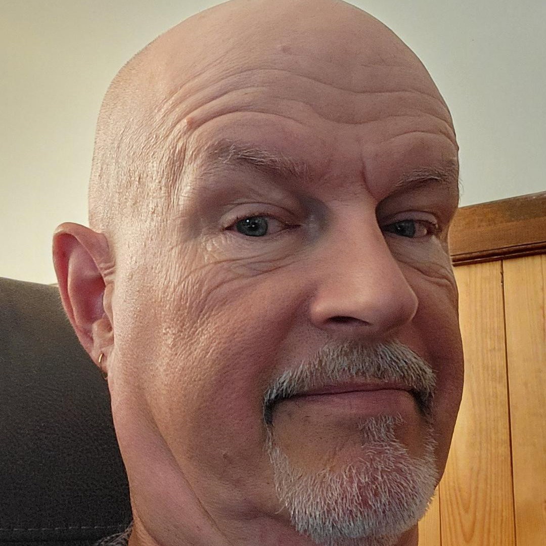 ALAN  CHRISTIANSEN 