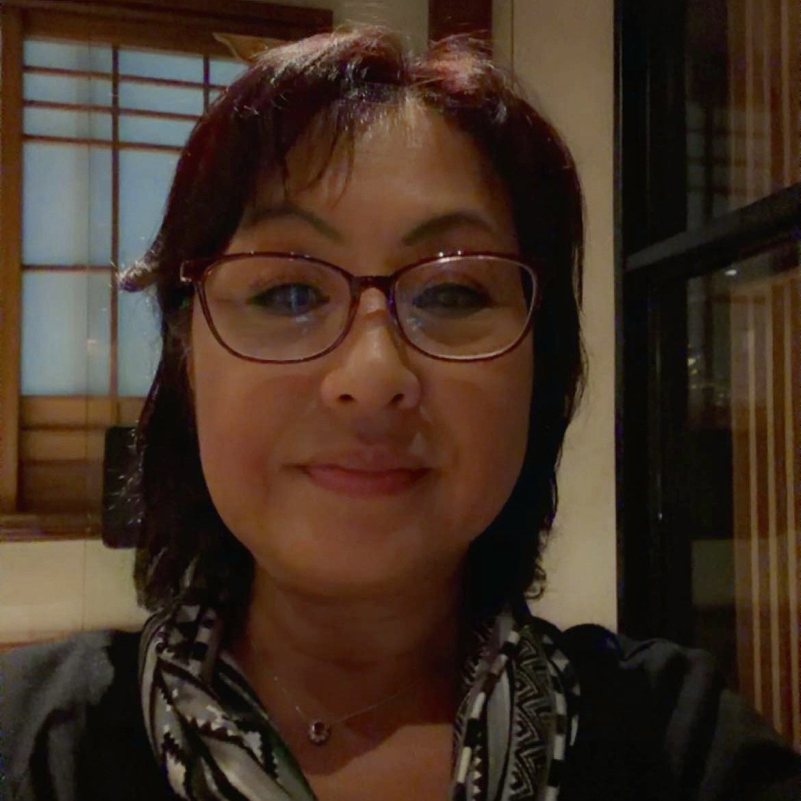 Tomoko  Olson 